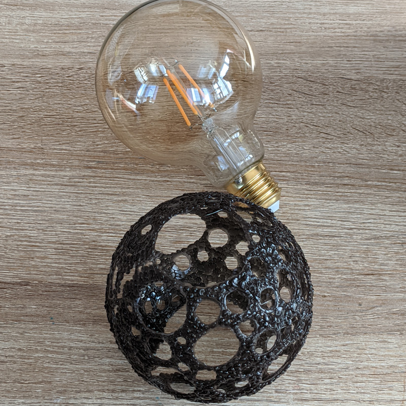 Creative 3D pen art with light bulb on table - Slider Pro