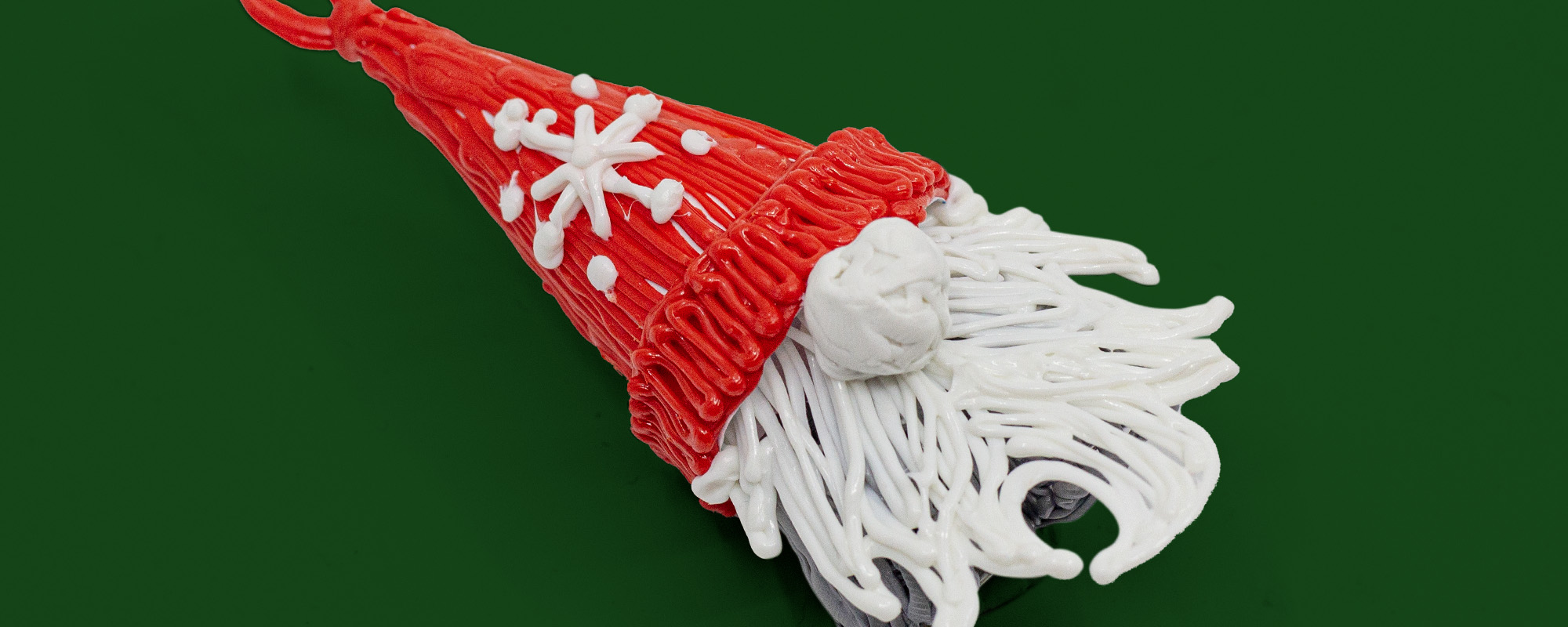 Red and white cake with snowflake hat (3D pen art)