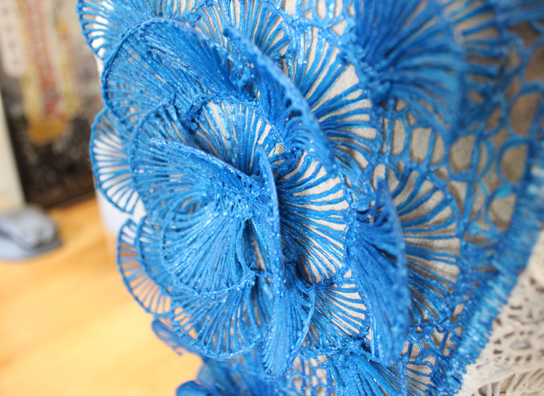 Blue lace flower on white table 3D pen art