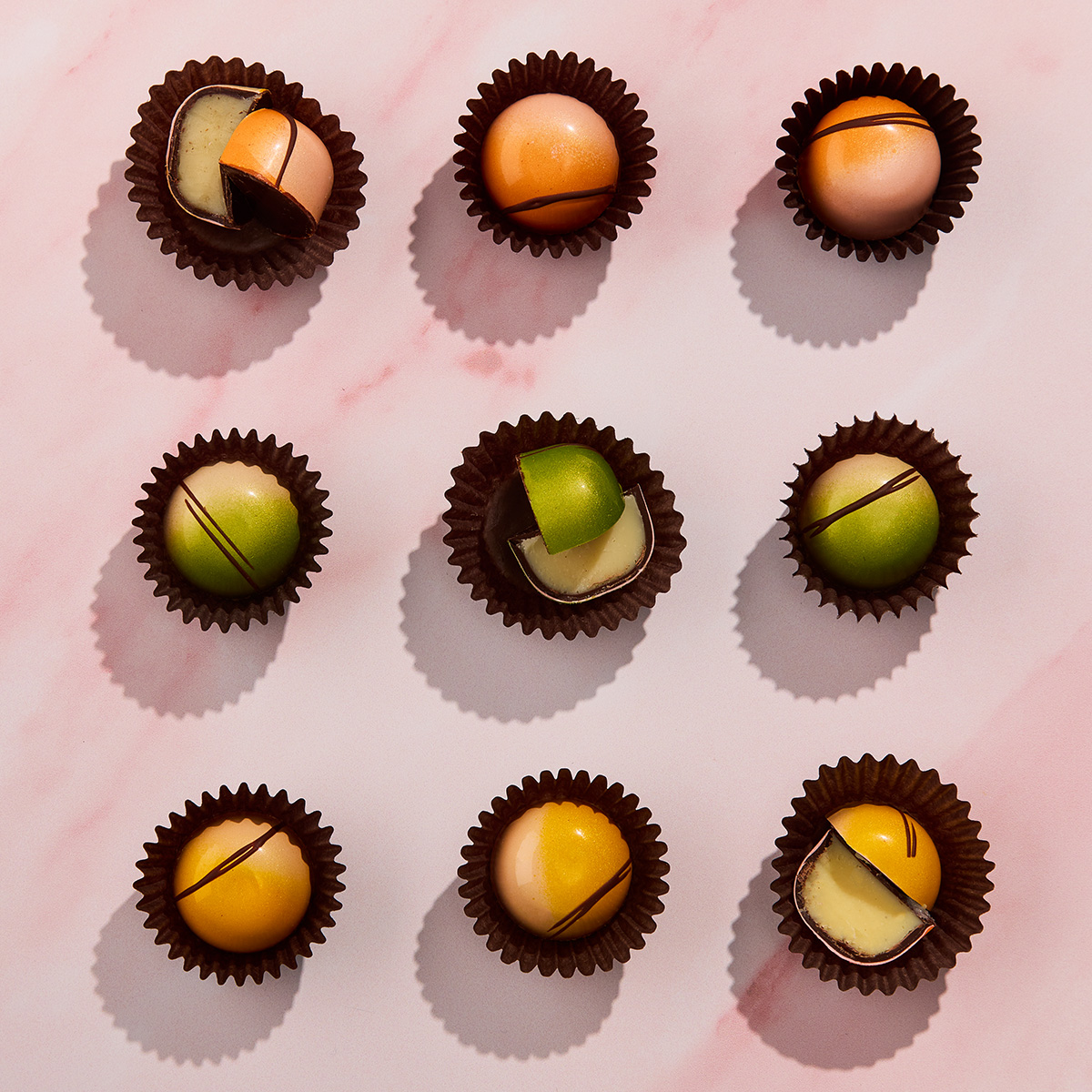 Pieces from our nine piece citrus trio, cut open to show creamy centers