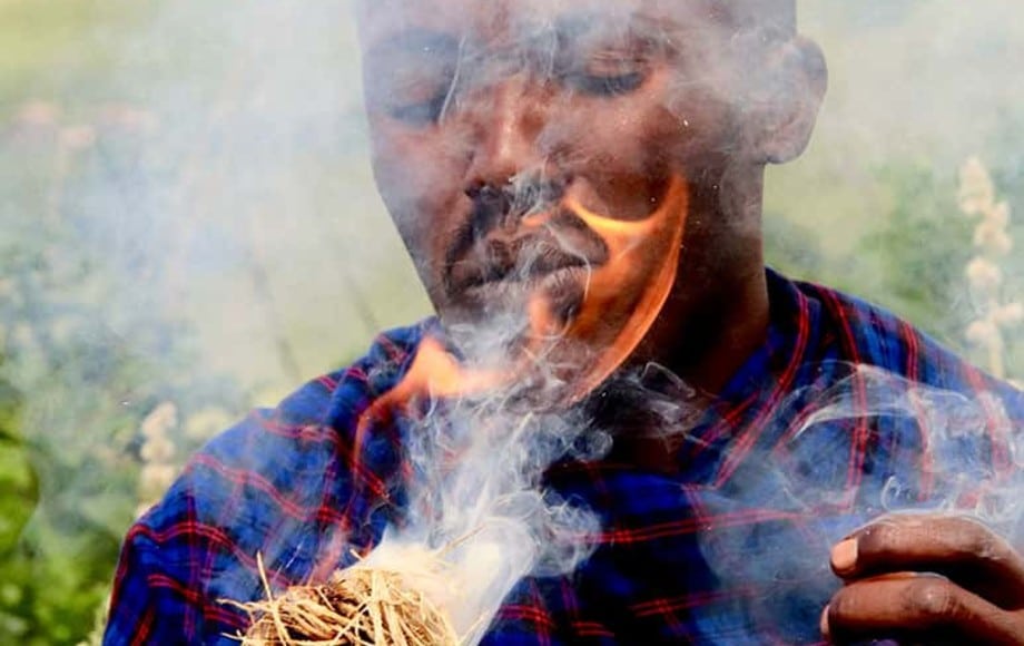 A man making fire