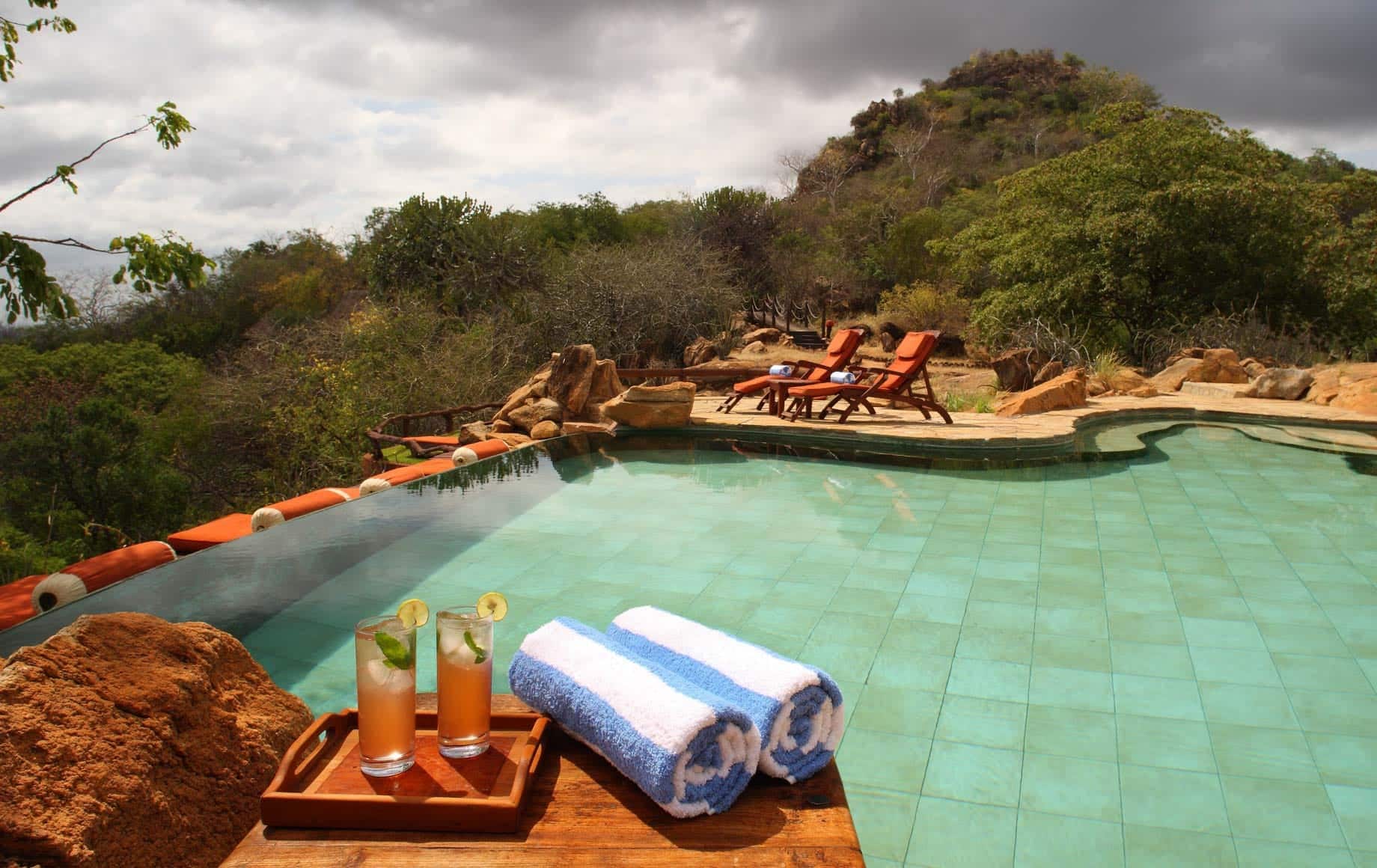 Enjoying champagne while watching sunset at Meru National Park, Kenya