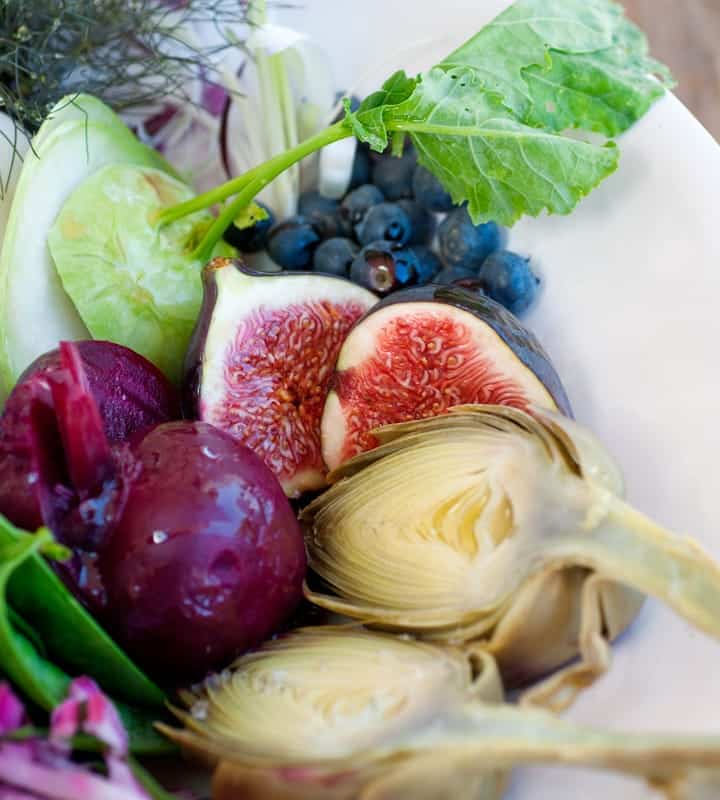 A dish full of colorful fruits