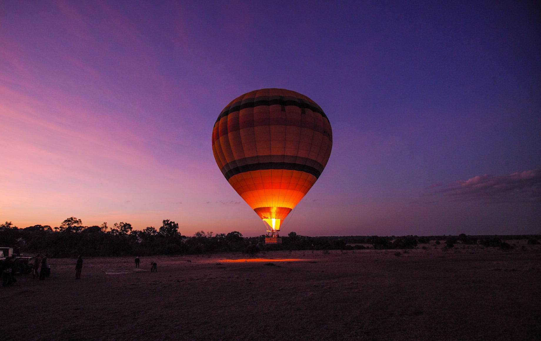 Hot air balloons floating over africa