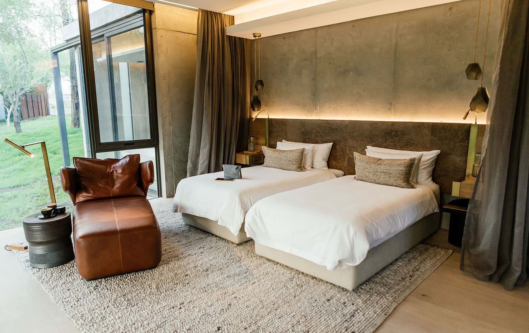 A bedroom with two full beds