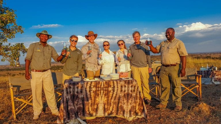 Tourists and guides making a toast