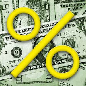 Image of several U.S. dollar bills with a percent sign in front of them