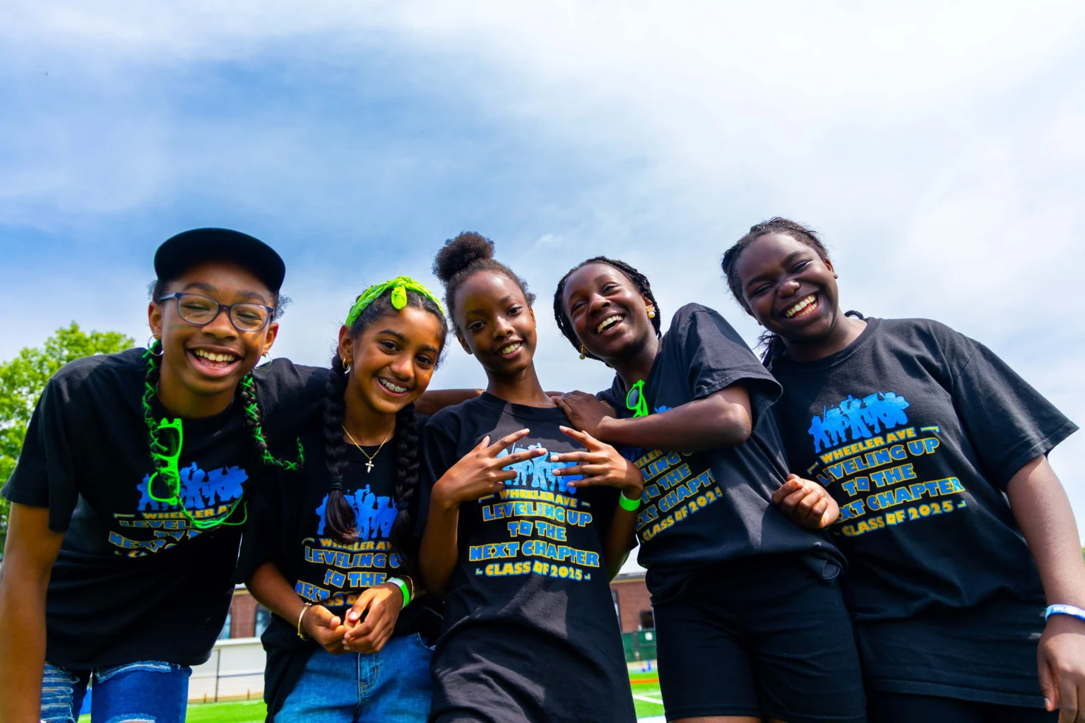 A group of campers wearing matching t-shirts.
