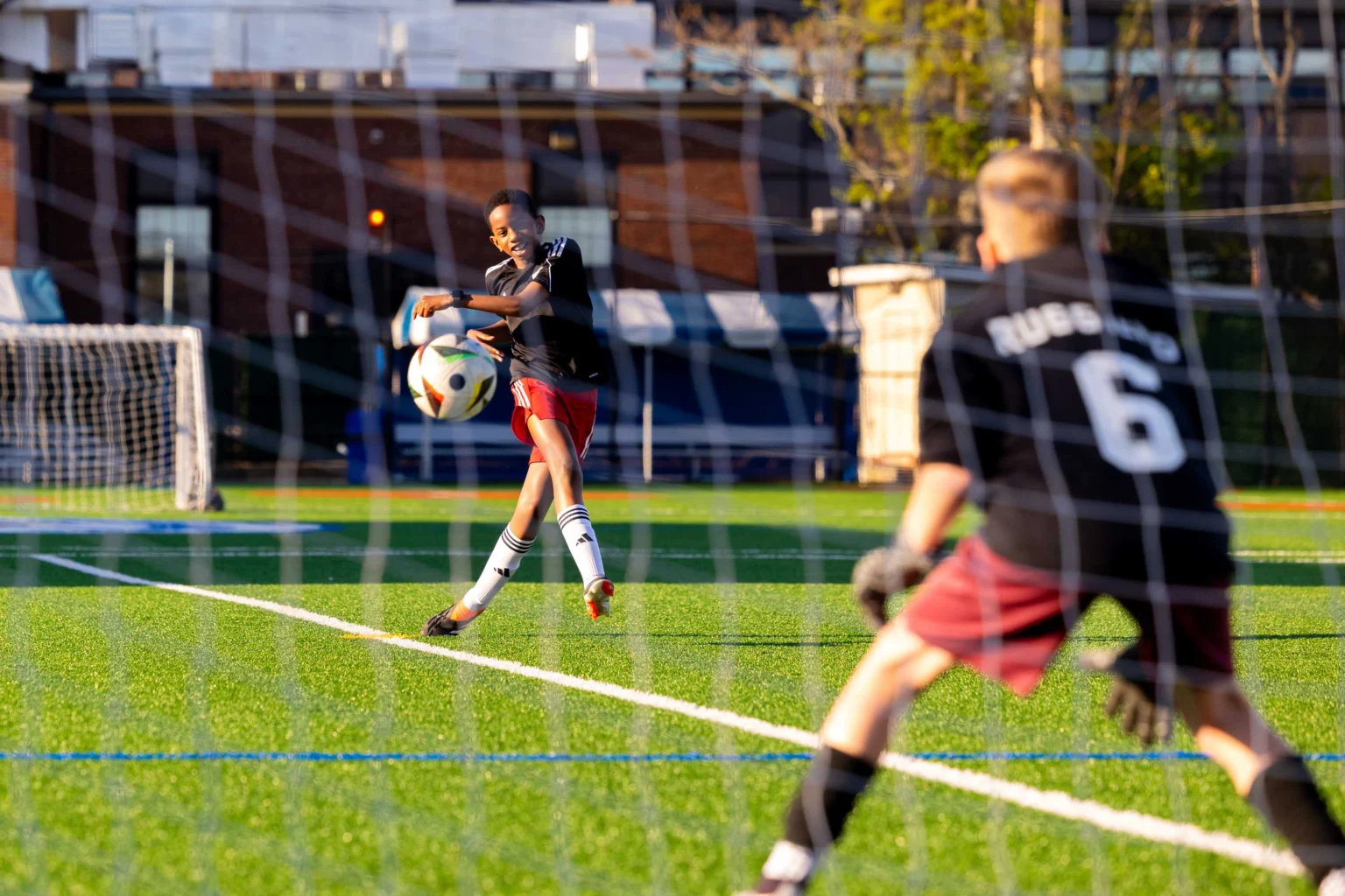 Campers playing soccer.