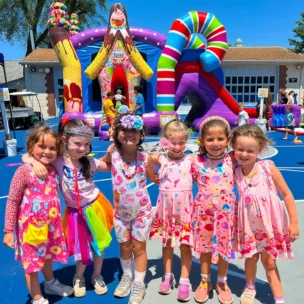 A group of young campers wearing pink.