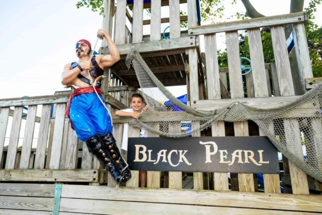 A camper at the black pearl pirate-themed playspace.