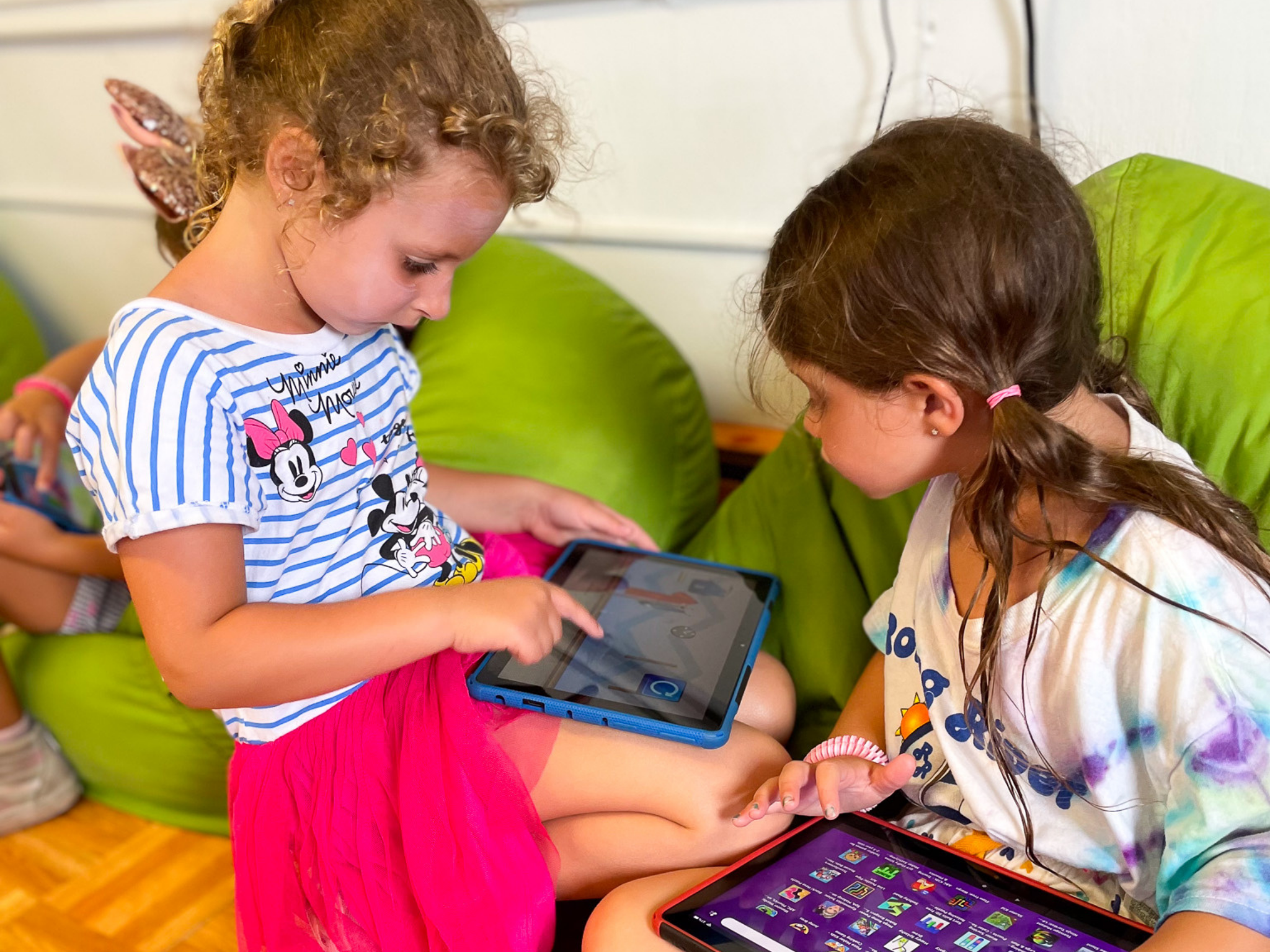 Campers using a tablet.