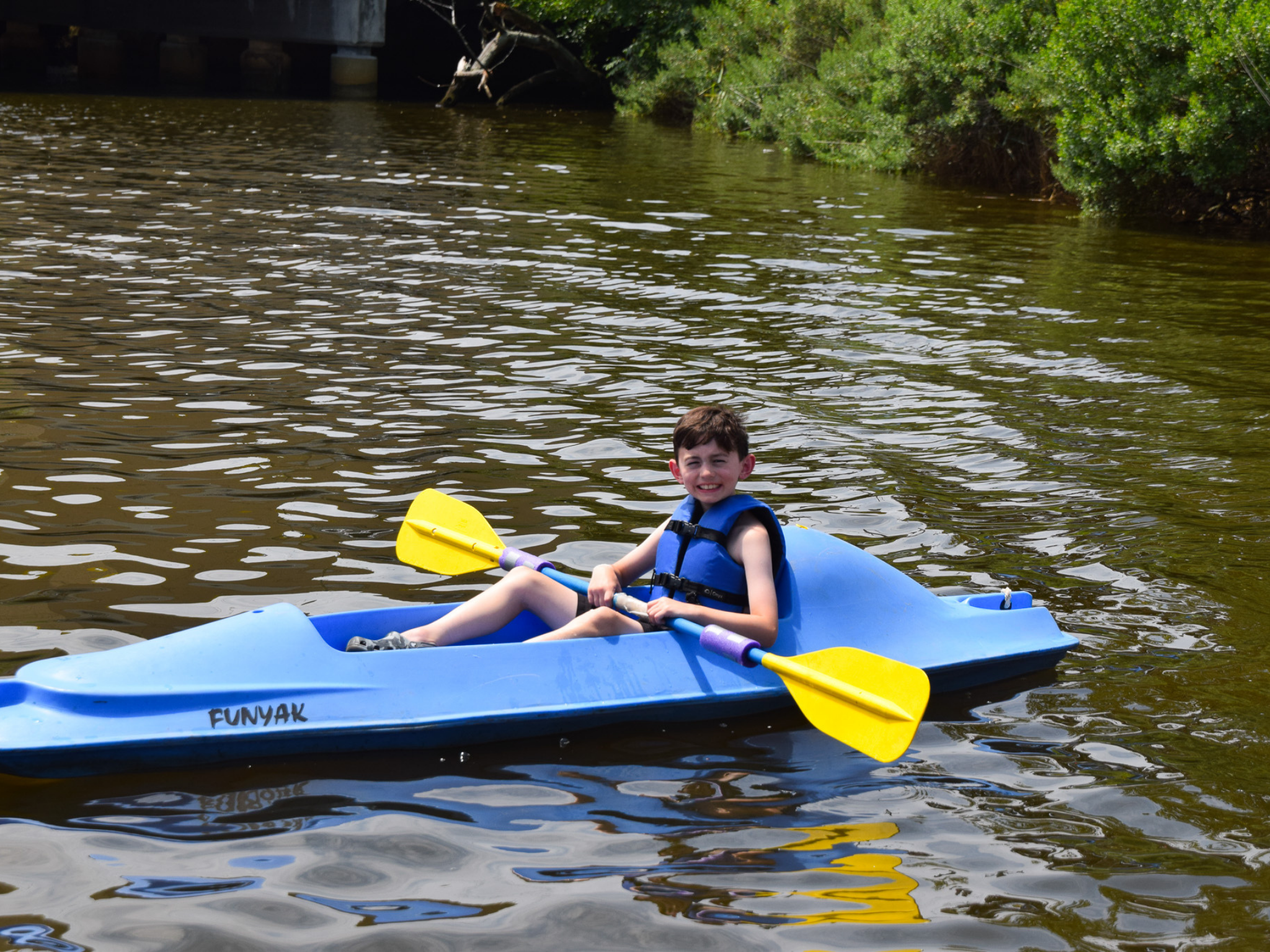 A camper on a canoe.