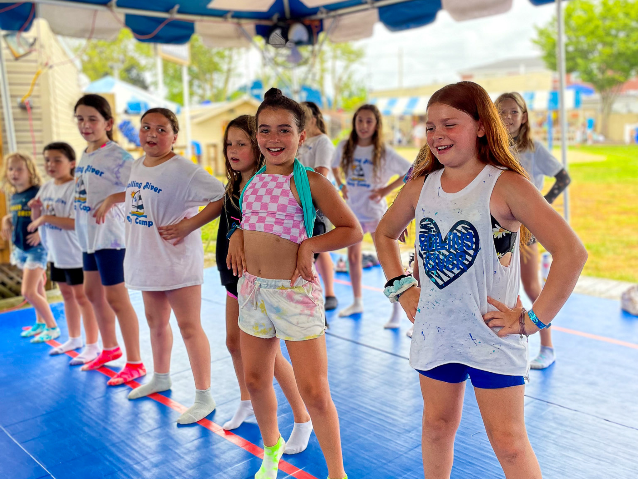 A group of campers dancing.