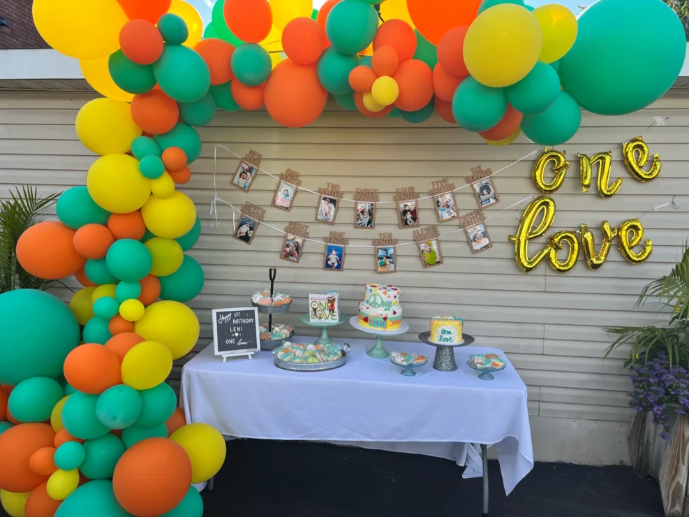 A table setup for a baby's birthday party.