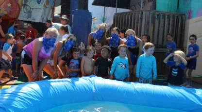 A group of campers wearing masks.