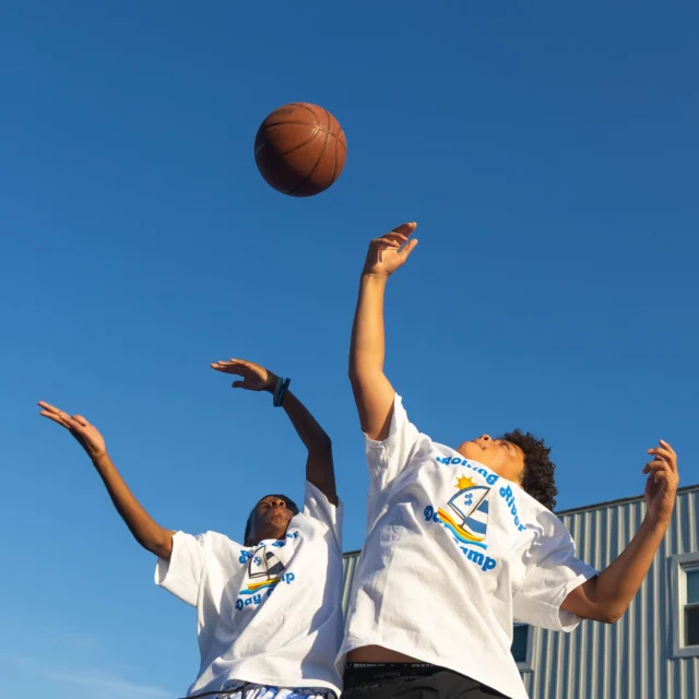 Campers playing basketball.