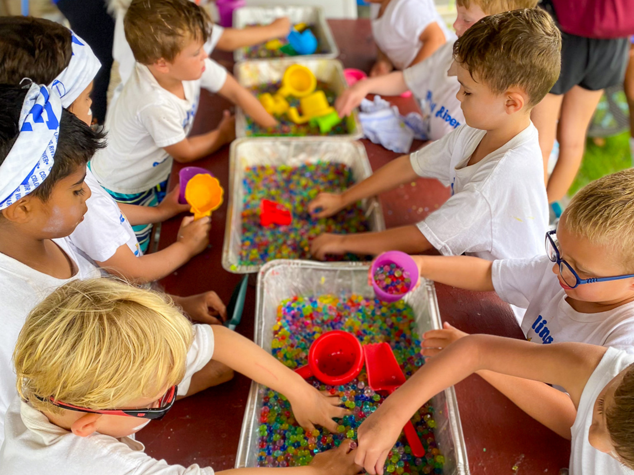 A group of campers in the middle of an activity.
