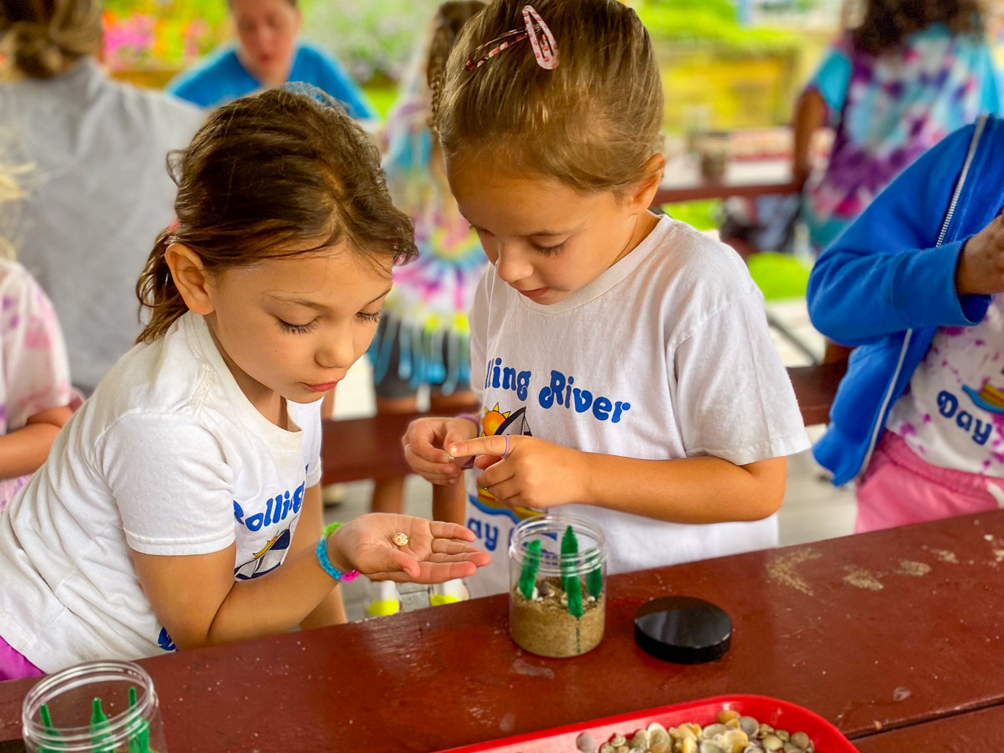 Two campers working on an activity.