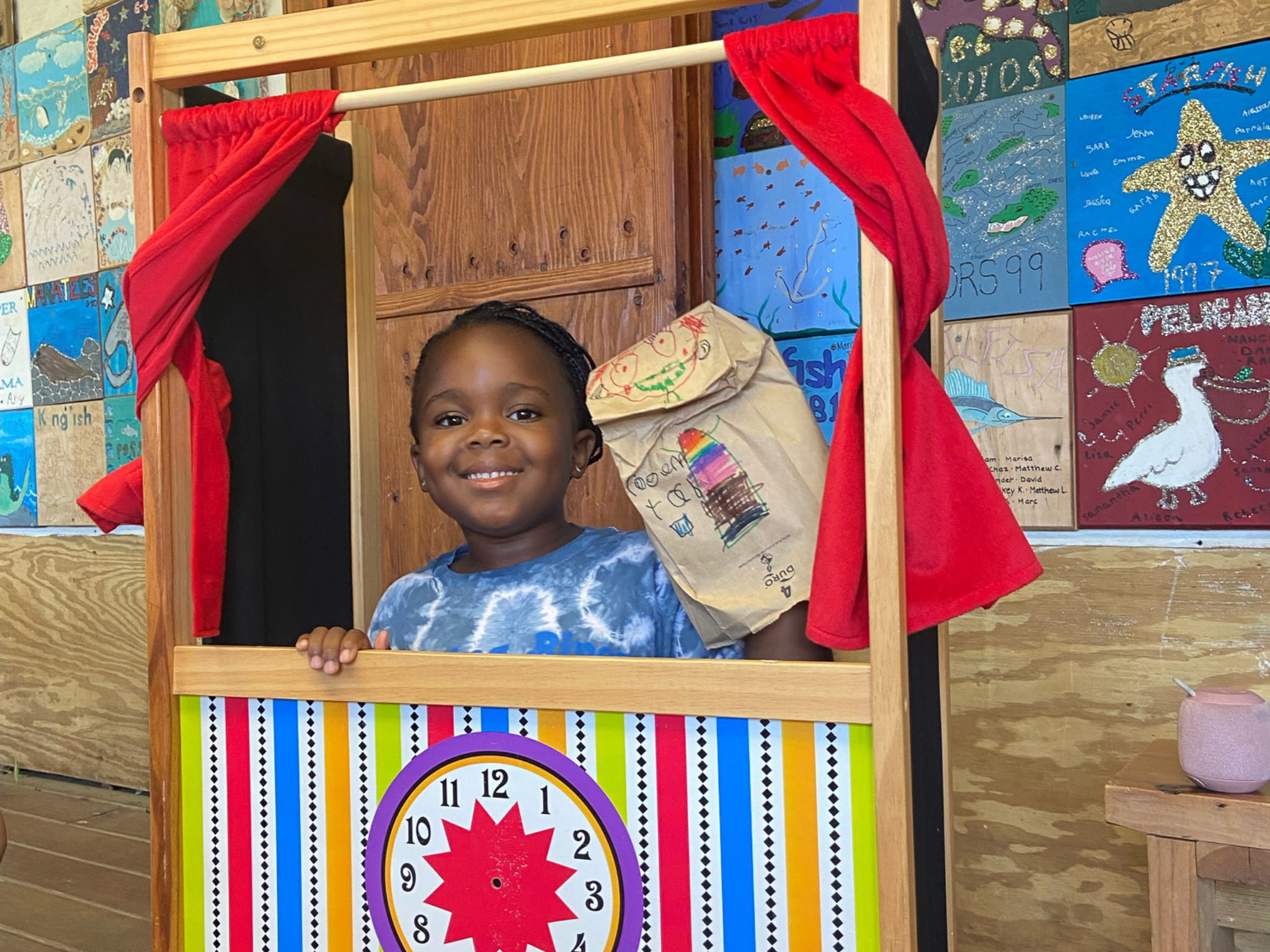A young camper smiling.