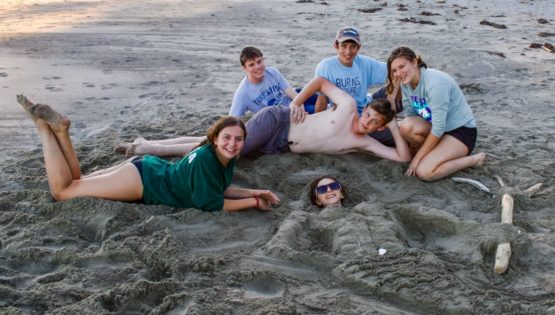 Playing on the beach on the Northwest Canada quest