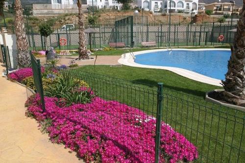 ImagenNydelig selveierleilighet med svømmebasseng, 18-hulls golfbane og dobbel garasjeplass. 2