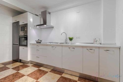 ImagenSuite con jacuzzi en el centro vistas y garaje 2