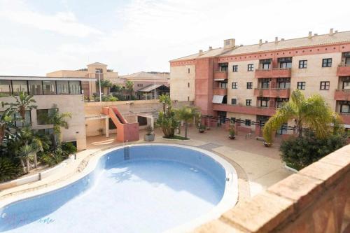 ImagenApartamento junto a la playa con piscina y parking 2