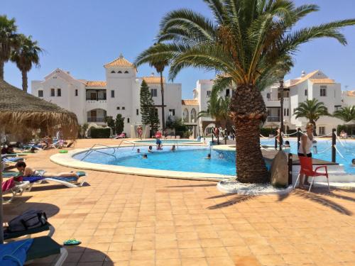 ImagenBajó en el campo de Golf, Orientación ideal todo el año Piscina-Terraza solárium-Wifi-Sat 1