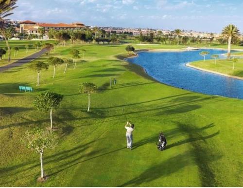 ImagenTriplex9 golf playa 1