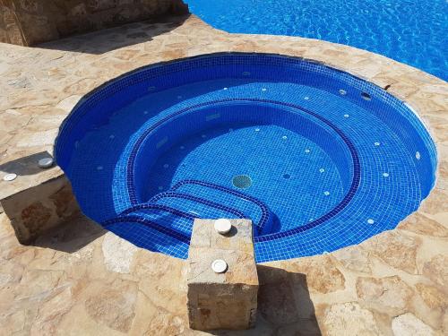 ImagenApartamento con hermoso jardín y AC 1