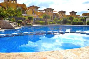 ImagenApartamento con hermoso jardín y AC 3