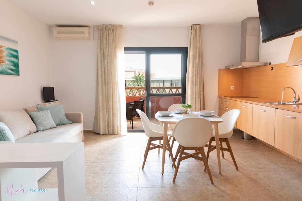 Apartamento junto a la playa con piscina y parkingimagen principal