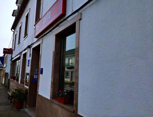 ImagenCasa Peto Outes 1