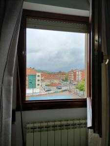 ImagenHabitación con vistas en Bádames compartido el piso con el propietario y otros huéspedes 9