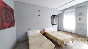 ImagenHostal Martes Cáceres Plaza Mayor - Tercer piso SIN ascensor 5