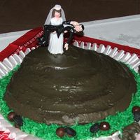 Pattycake.jpg This is the cowpatty cake that was requested by the bride for my grandsons wedding. The tumble bugs were made from clay and couldn't...