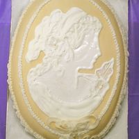 Cameo This was my first time using MMF, it was wonderful. I covered the cake with the MMF and then used the colorflow technique for the Cameo.