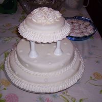 Grandparents Anniv. Fondant covered with fondant flowers and some buttercream