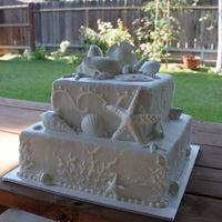 Ocean Dreams Smooth frosted butterecream cake. I purchased a sea shell kit and put pearl dust on it.Bride just loved this...so did I!!!!