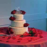 Red Roses Cake (Charlene) Smooth frosted buttercream cake. All white cake with whipped chocolate ganache filling.I placed roses and topper on cake. This one looked...