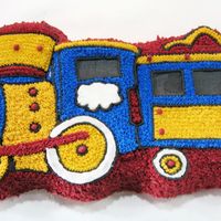 Train Character Cake The product of the first cake decorating class I took. This was actually the first cake I ever baked and decorated. It took me quite a...