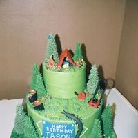 Lawnmowing And Camping Cake everything is edible. Fondant tent, man, blanket, hiking boots, logs and rocks, bird, lawnmower, gas can, rake, trashcan, and centipede(...
