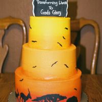 African Sunset Send off cake for a family about to head off to the mission field in Africa. All buttercream with gumpaste accents.