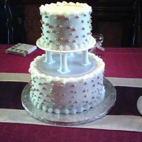 Cid__1005081522A.jpg I made this cake for a couple's 50th wedding anniversary. It is 6in. and 10in. rounds. The cake is Duncan Hines French Vanilla with CK...