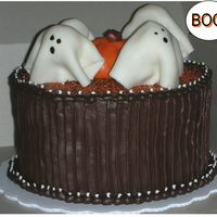Ghosts Love Chocolate! Total copy of VickiC's cake...but hers is SO much better!! Thanks for posting your cake VickiC!! I'd had a little too much coffee...