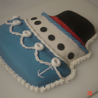 Bon Voyage Wilton's Topsy Turvy cake pan makes a great cruise ship! Covered in Fondant. This one was a lot of fun.