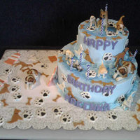 Puppies! This birthday cake was for a Special Birthday Girl who LOVES puppies! Everything is edible but her puppy dogs. I let her place them...