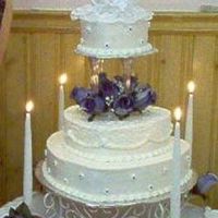 Ted & Lise White cake iced with buttercream, middle layer is decorated with cornelli lace. This was my very first wedding cake, I made it as a gift...