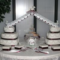 Nicole & Mich Two 3 tier buttercream cakes,, one was white and the other chocolate( as well as the smaller cakes in front). I made this cake as a gift...